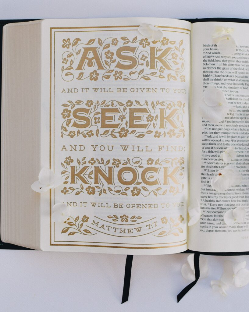 Photo of a Bible with illustrated quote